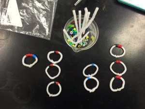 Balancing equations using beads.